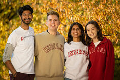 Group of diverse students in IU gear.